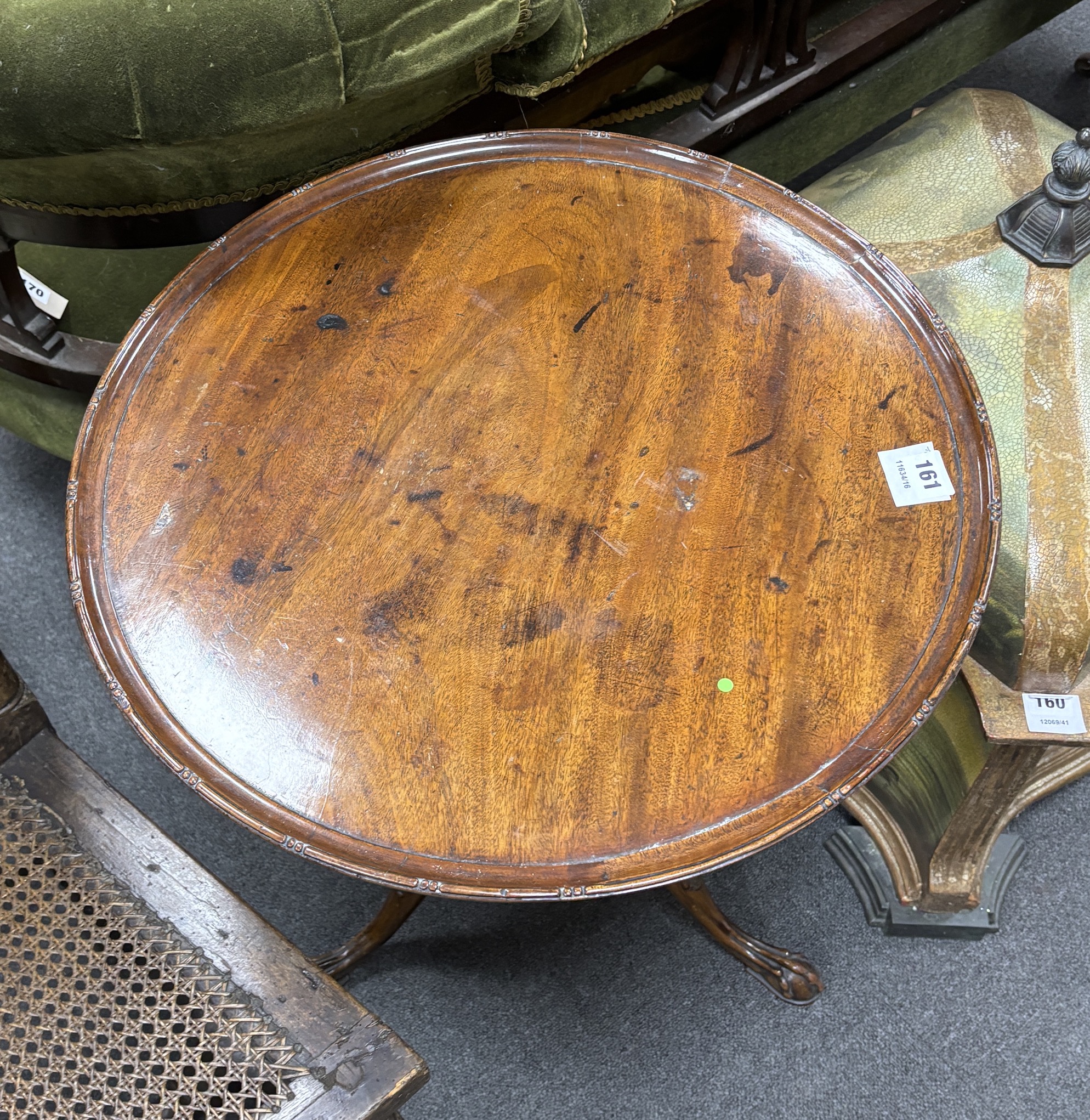 A George III style mahogany circular tripod tea table, diameter 54cm, height 63cm
